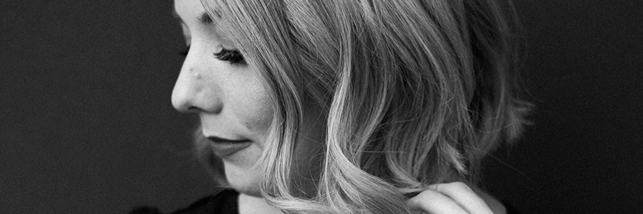 How the 5 Stages of Grief Apply to Chronic Illness A black and white photo of the author