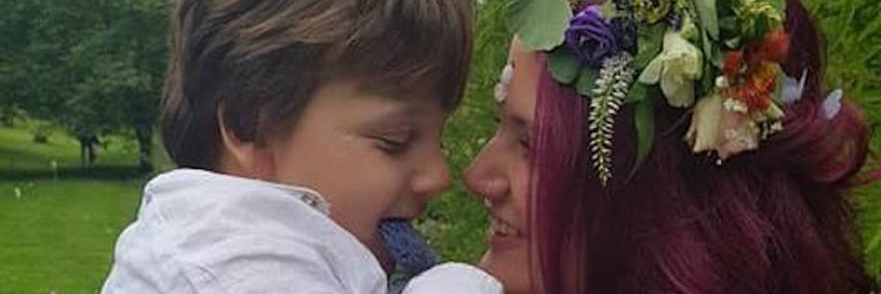 What I Like About Parenting a Child With a Disability Mom and child looking at each other smiling