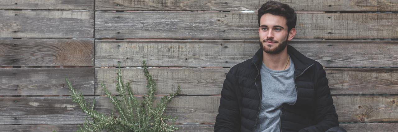 Do You Have a 'Sense of Entitlement?' man sitting on bench holding coffee cup