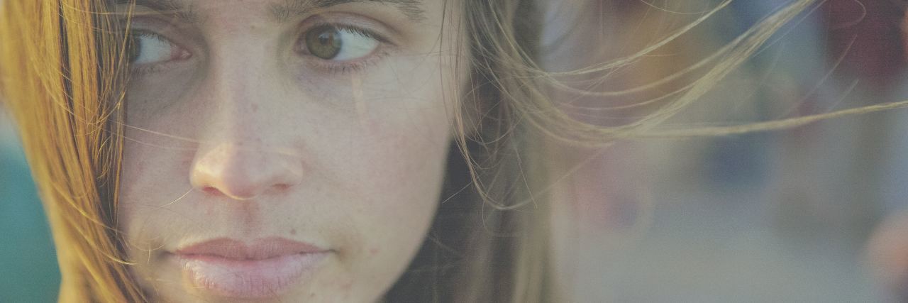I'm Scared to Go Home After Eating Disorder Treatment close up photo of young woman looking scared