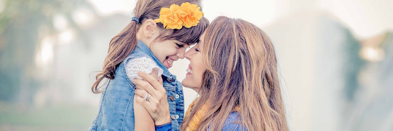 A Letter to My Daughter With Autism on Mother's Day The author and her daughter embracing