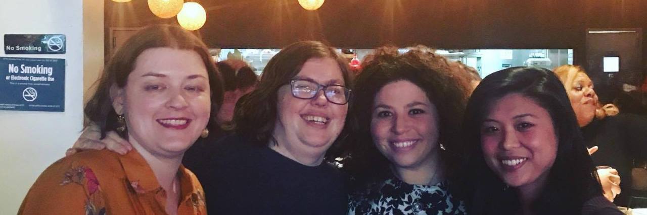 Growing Up With a Speech Disorder Eileen with three female friends at an apraxia awareness event.