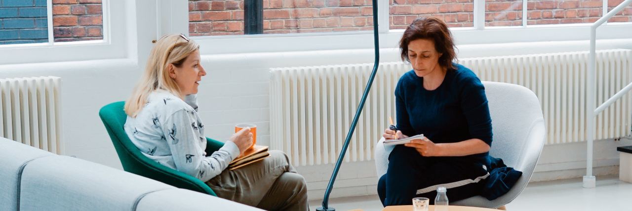 How to Improve Doctor Appointments for Yourself and Your Child a doctor sitting across a patient in a room