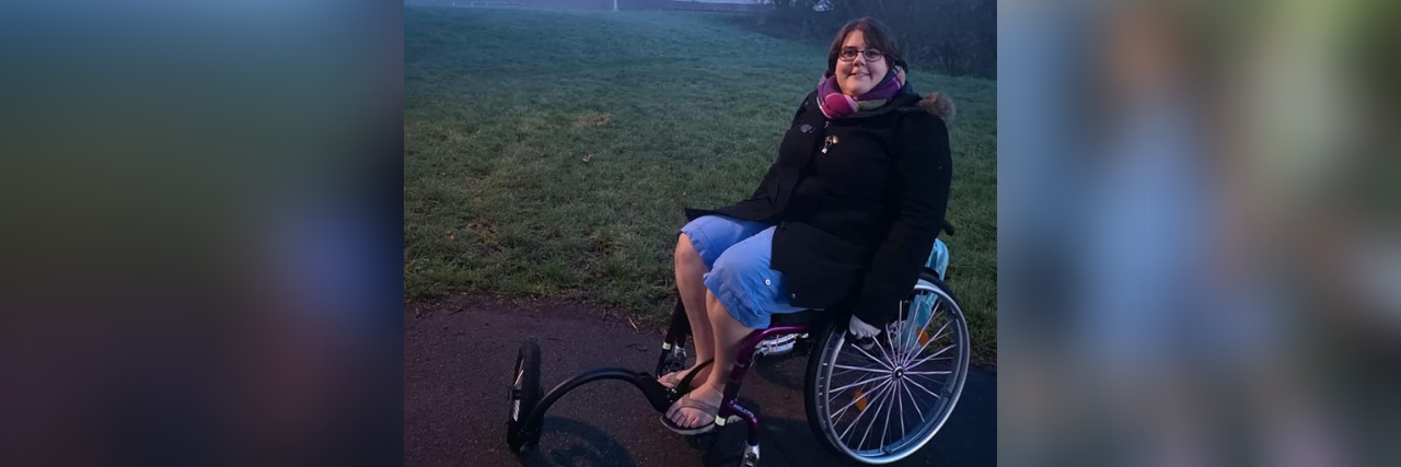 Things Not to Say to a Wheelchair User Sophie sitting in her manual wheelchair outdoors.