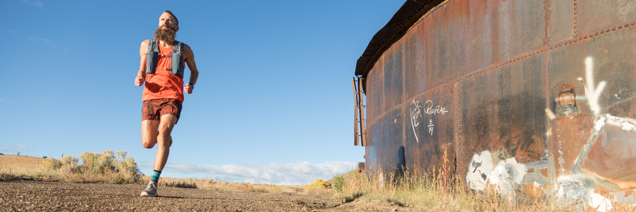 The Parallel Between Depression and My Ultra-Long-Distance Running Career Professional ultrarunner rob krar running in arizona desert