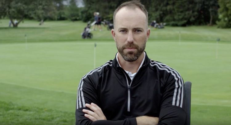 photo of professional golfer andrew jensen with crossed arms in front of golf course