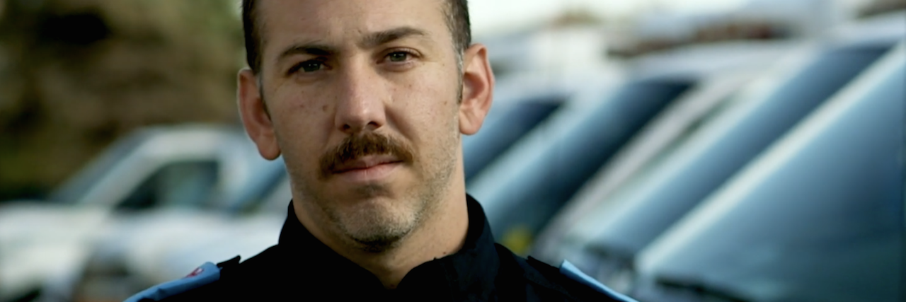 Advice From a First Responder Who Lost a Friend to Suicide A photo of the author in uniform