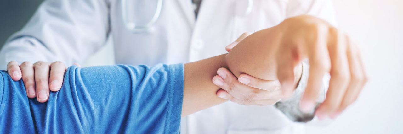 What Doctors Should Say to People With Undiagnosed Chronic Illness Doctor consulting with patient.