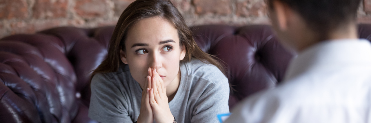 Choosing a Psychiatrist as Someone With Cerebral Palsy Young woman visiting psychiatrist.