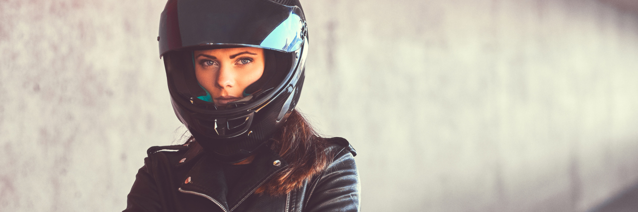 Choosing to Be Vulnerable Despite Past Trauma woman in leather jacket and helmet