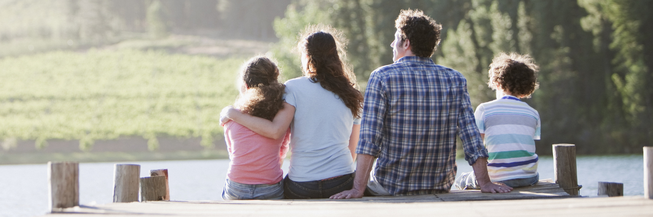 Raising Awareness for Pitt-Hopkins Syndrome: What It Feels Like family sitting on dock looking out on a lake