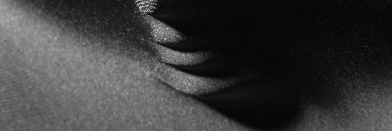 What It's Like to Have Fatigue With a Chronic Illness Mysterious closeup portrait background of human face