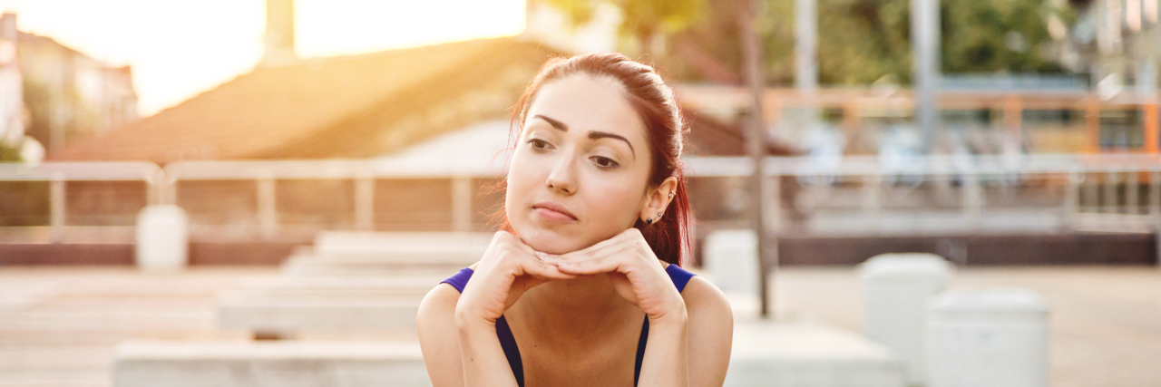 It's Not Your Place to Decide If My Sexual Assault Was a Big Deal young student looks bored while waiting for someone