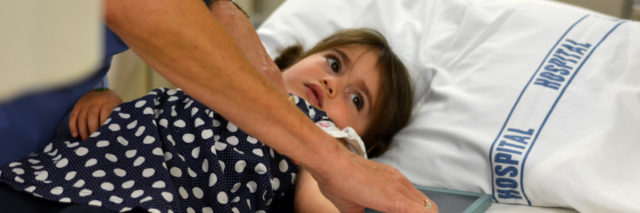 Little girl at hospital getting x-ray of arm