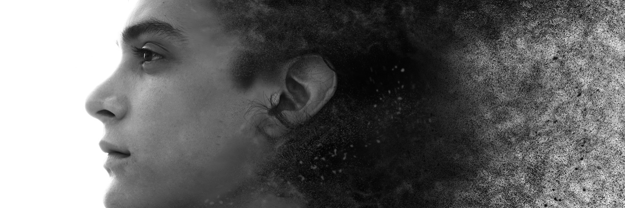 What It's Like to Almost Die After a Suicide Attempt A man with a fuzzy hallo around his head, as if he's disappearing