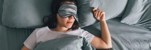 woman sleep with eye mask