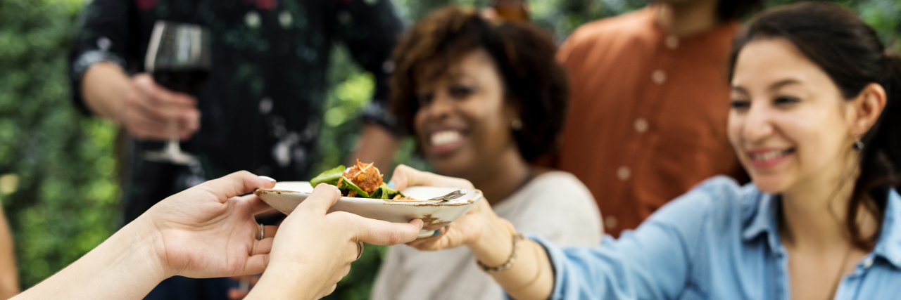 Please Don't Forget I'm Disabled Group of diverse friends enjoying summer party together.