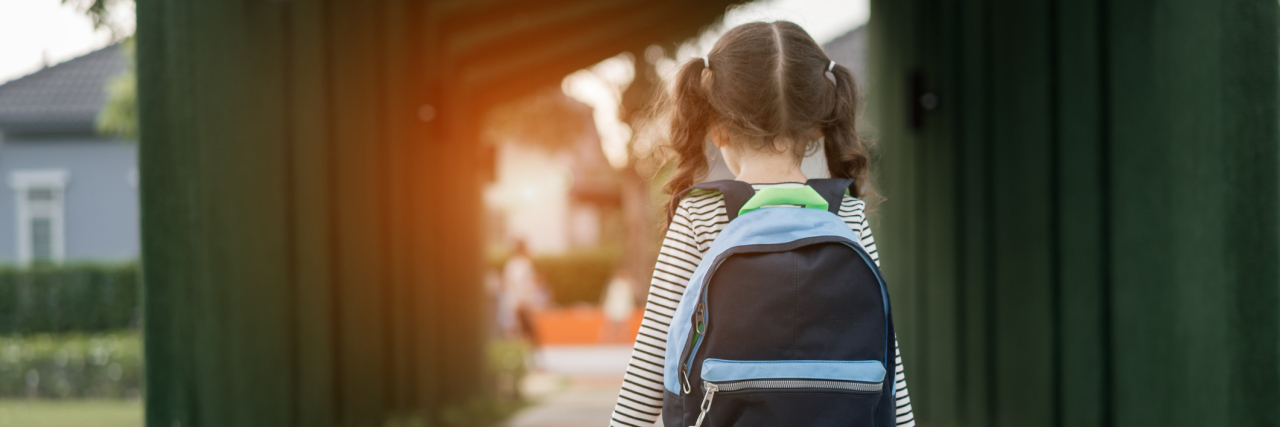 Why It's Harder for Girls to Get an Autism Diagnosis Kid girl pupil walking back to home after learning study school alone with schoolbag,preschool and kindergarten education concept.