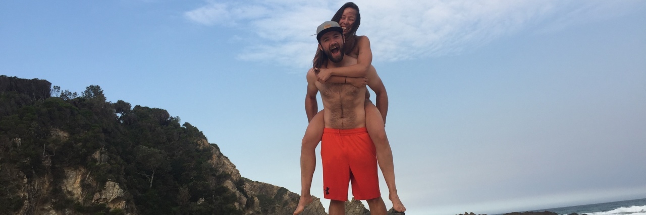 Keeping Relationships Strong When Chronic Illness Changes Someone Kristiana and her partner, Jordan on the beach.