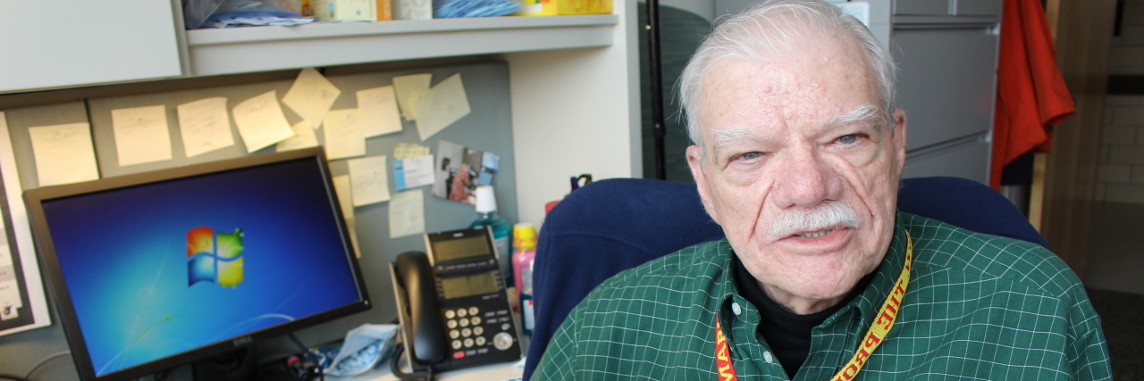 KHN: Mini-Biographies Help Clinicians Connect With Patients Patient Bob Hall holds a photograph of himself playing with children i n a village in Vietnam during his time as a Marine.