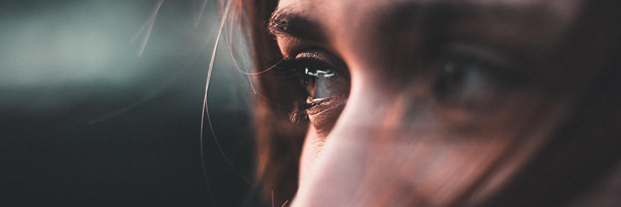 Using Dialectical Behavior Therapy to Challenge Myths About Emotions close up photo of woman crying and tears in eyes