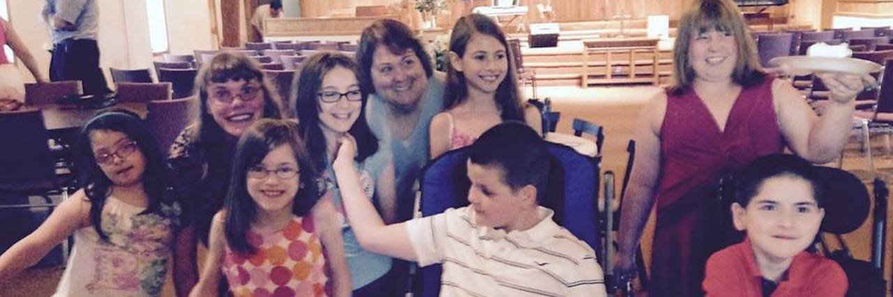 Churches Need to Stop Asking Individuals With Disabilities to Leave Group photo of children with disabilities at church