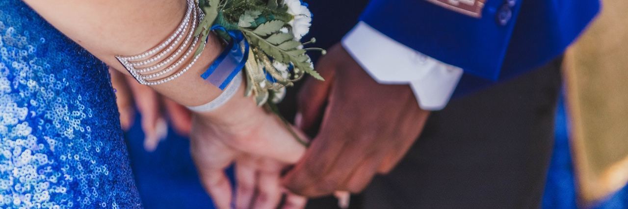 New Jersey Students With Disabilities Forced to Leave Prom Early Couple dressed for prom holding hands