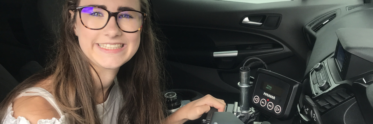 Learning to Drive in the U.K. With Cerebral Palsy Georgia learning to drive with her tiller system.