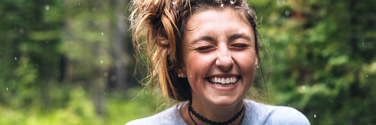 13 One-Liners About Living With Bipolar Disorder A woman smiling