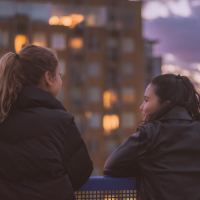 two women looking at view