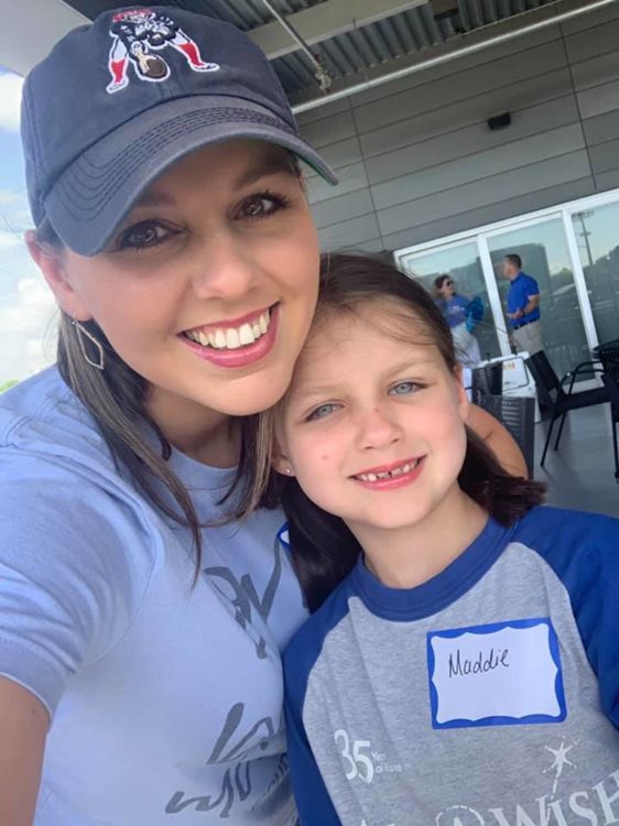 mom and daughter smiling