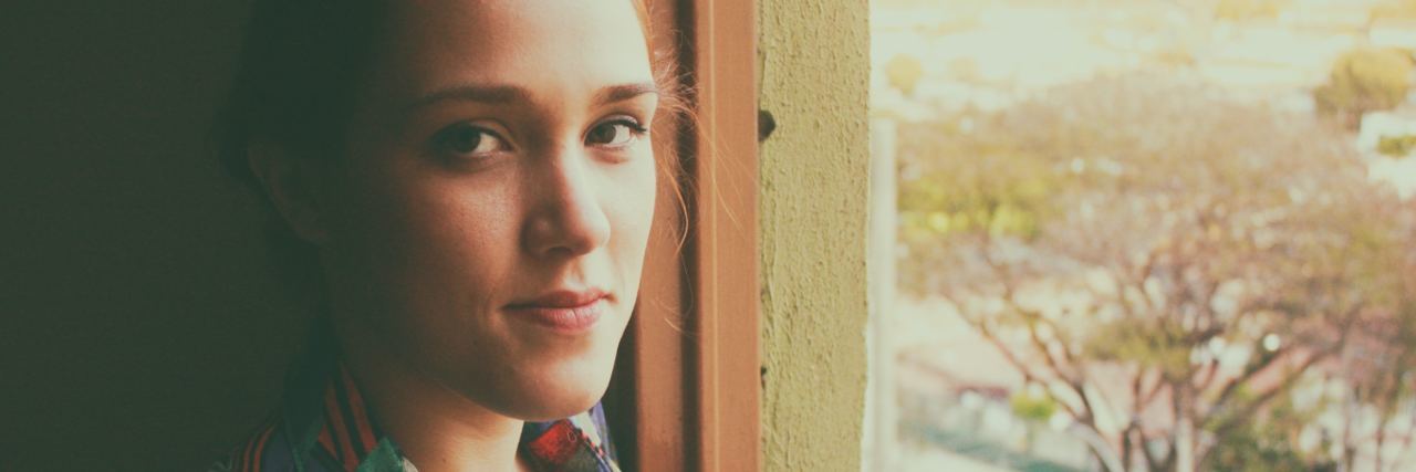 ‘Simple’ Ways to Begin Mental Health Recovery photo of young woman in afternoon light looking into camera