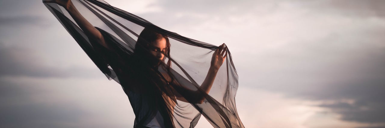 Memories of an Abusive Relationship A woman with a black shawl