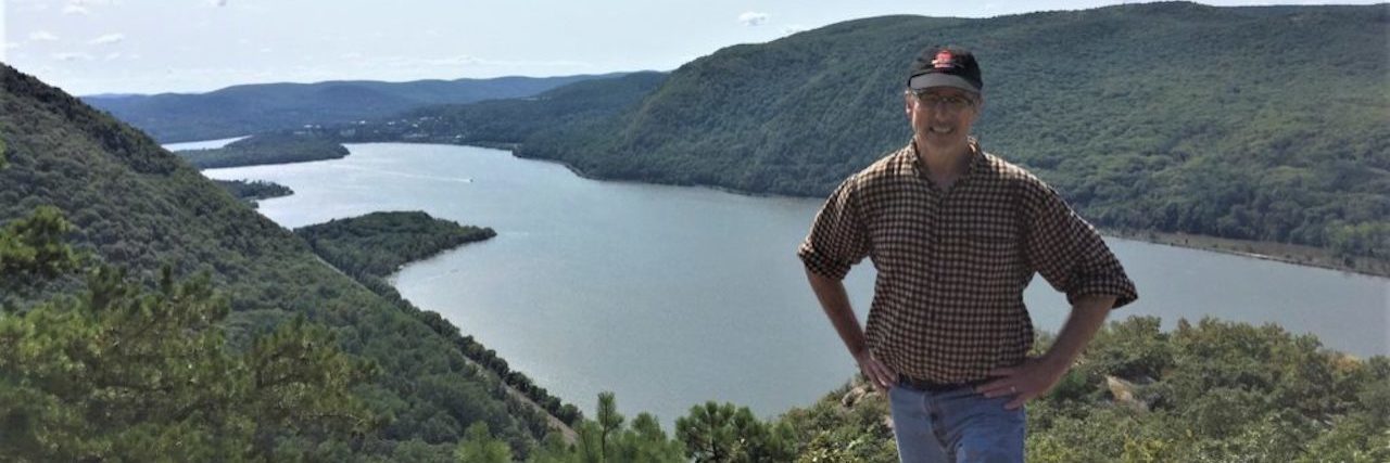 What I Do to Stay Healthy With Parkinson's Disease bruce ballard on cliff overlooking river and valley