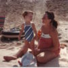 The author as a child and her mother, at the beach