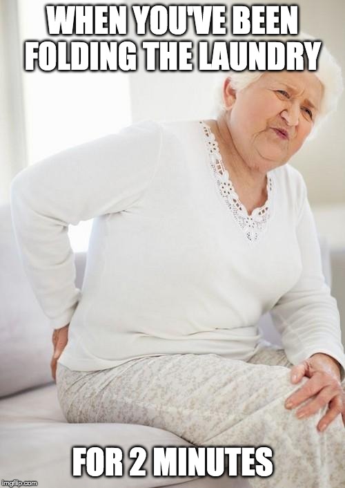 meme of older woman holding her back in pain. the caption reads: when you've been folding laundry for 2 minutes
