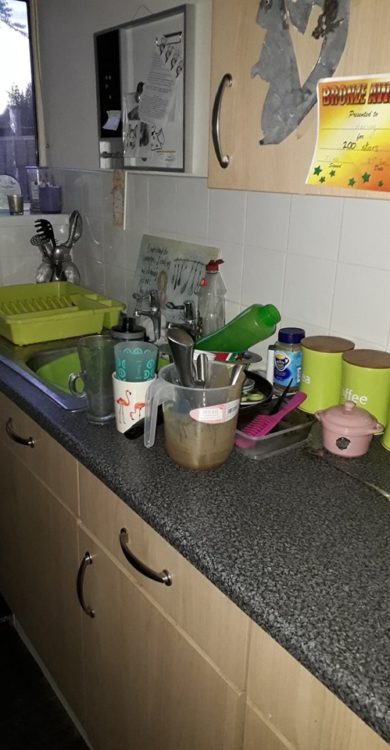 kitchen counter with dirty dishes
