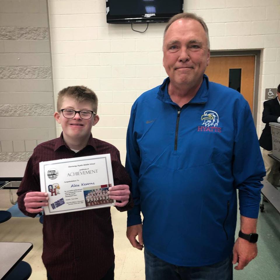 Alex getting a basketball award.