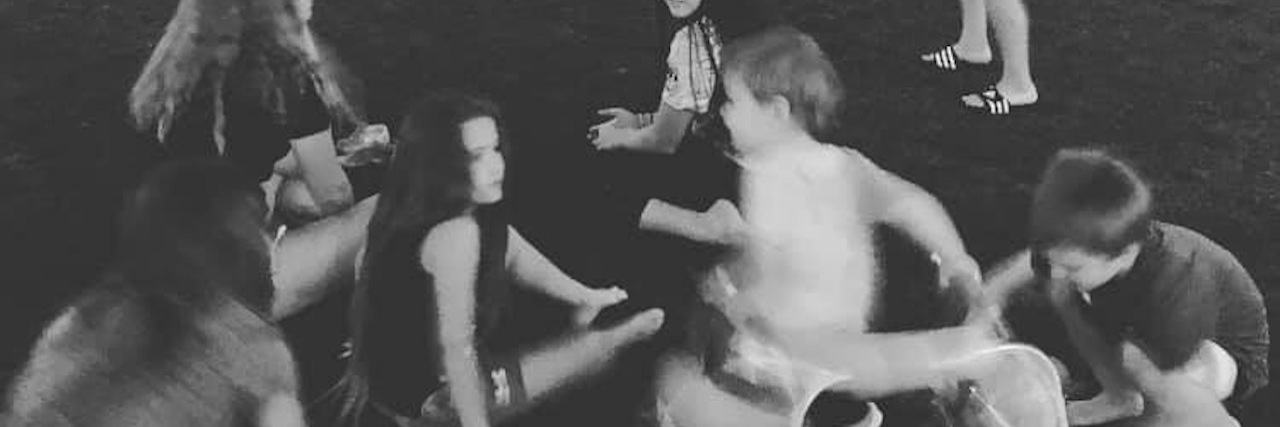 When Strangers Assume Your Life Parenting a Disabled Child Is Sad Black and white image of kids dancing, one uses a walker