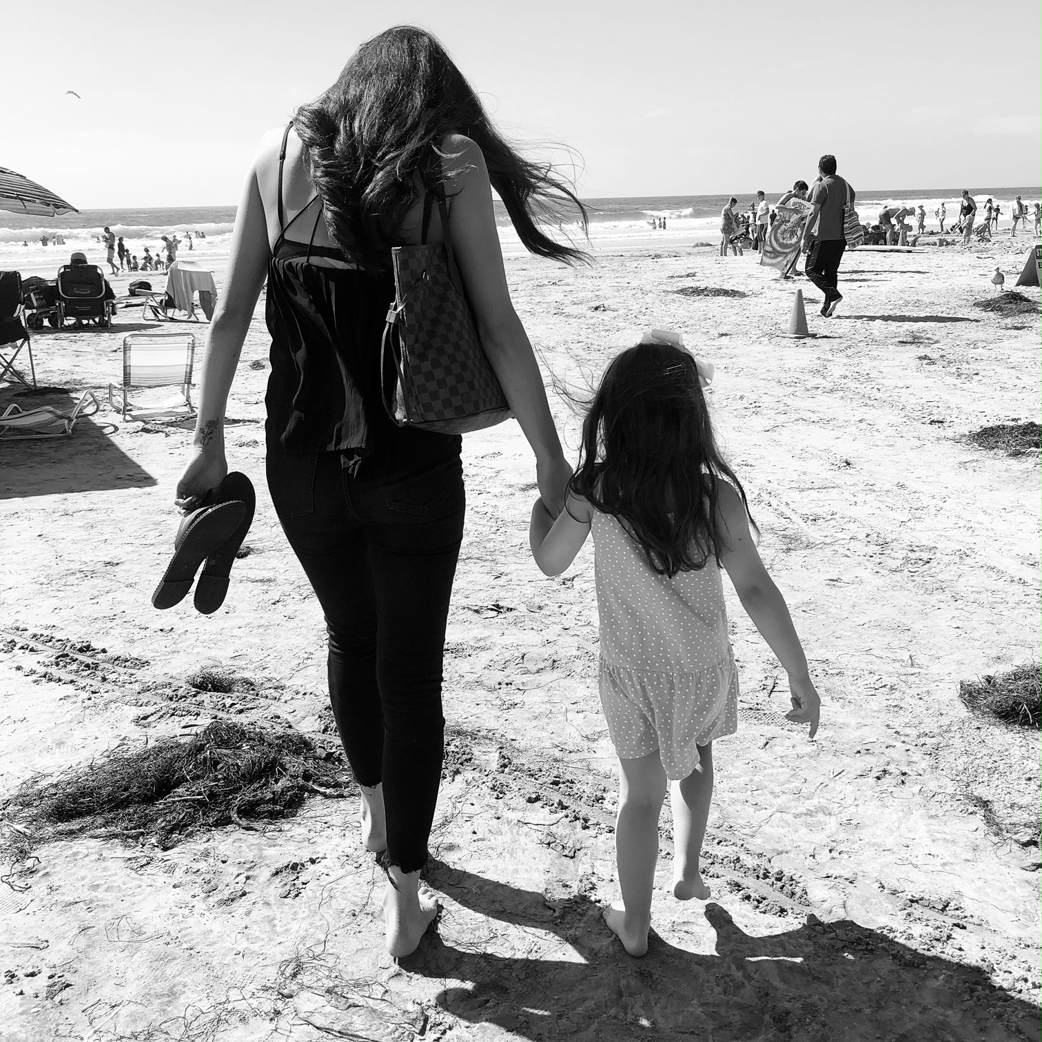 Caelin and Campbell walking on the beach