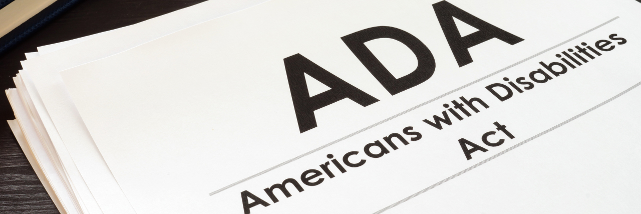 How the ADA Could Be Improved Americans with Disabilities Act paper next to keyboard.