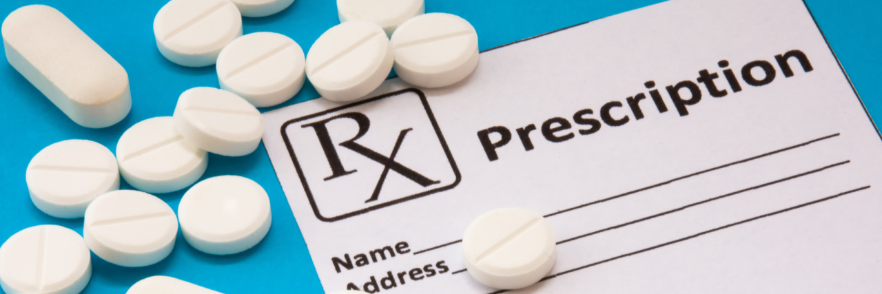 Study Shows Opioid Tramadol, Antidepressant Interactions Clean recipe for prescription drug statement is near scattered white pills and tablets on a blue background. Pharmacological or medical concept photo to refer to prescription medicines for patients