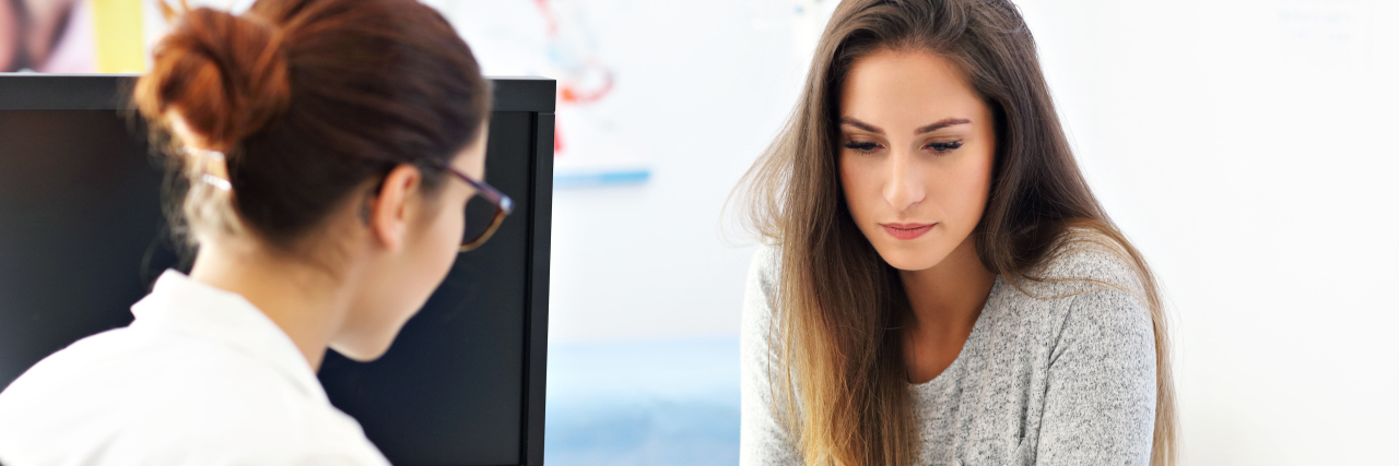 Dealing With Patient Guilt at Doctor's Appointments Picture of adult woman having a visit at female doctor's office