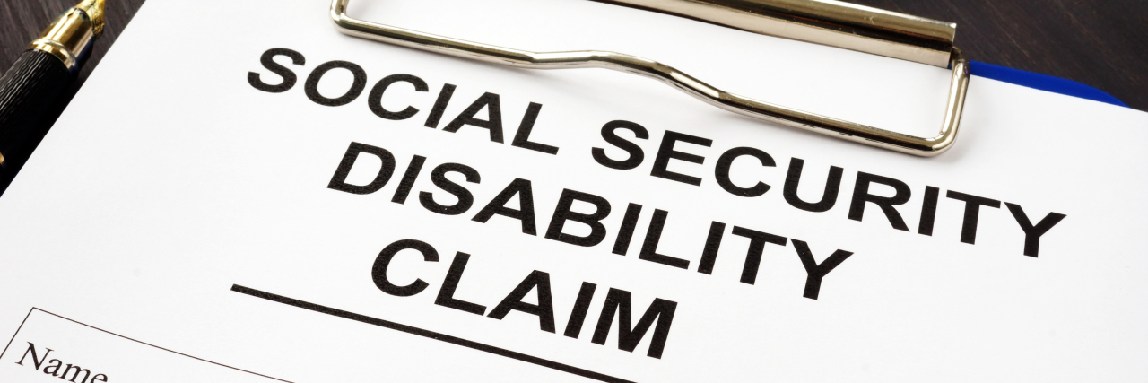 Getting Approval for Disability Benefits on the First Try Social security disability benefits claim and pen.
