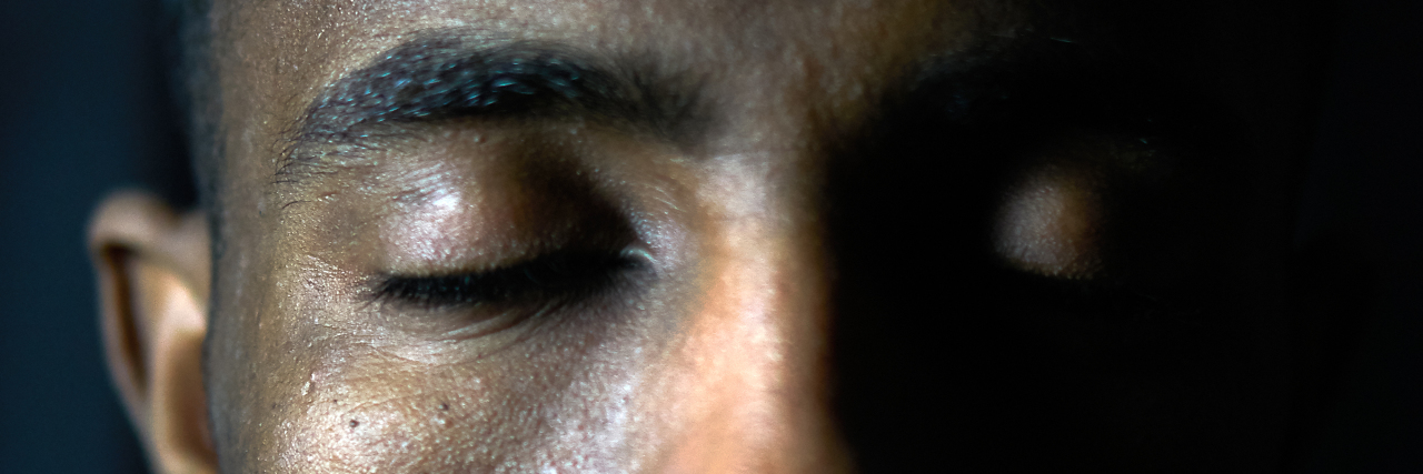 The Day I Was Diagnosed With Crohn's Disease young man with his eyes shut