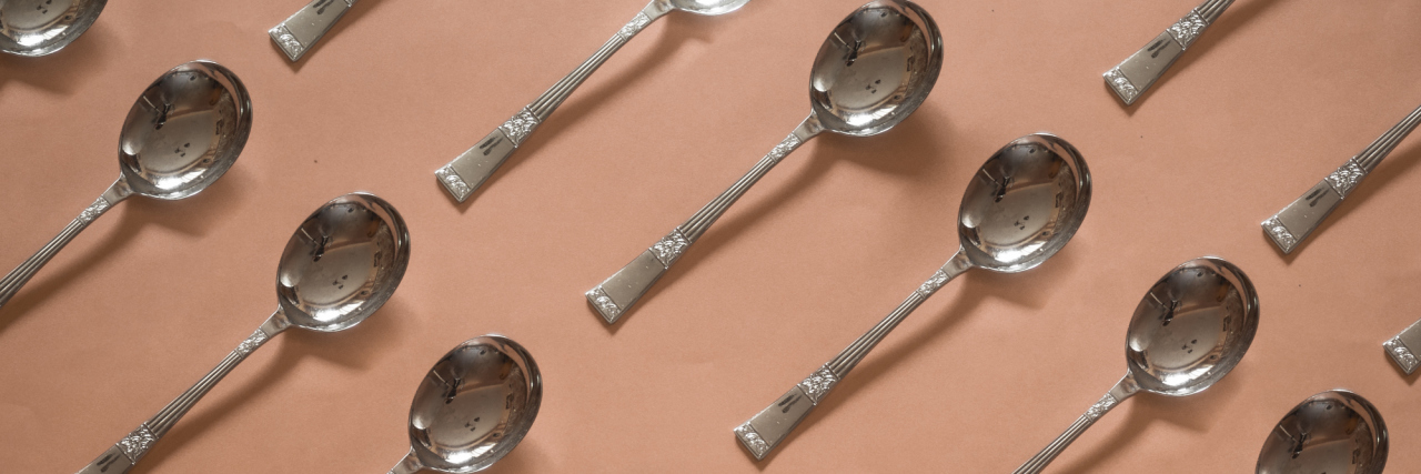What Happens When Your Chronic Illness Is Invisible silver spoons on a cream background