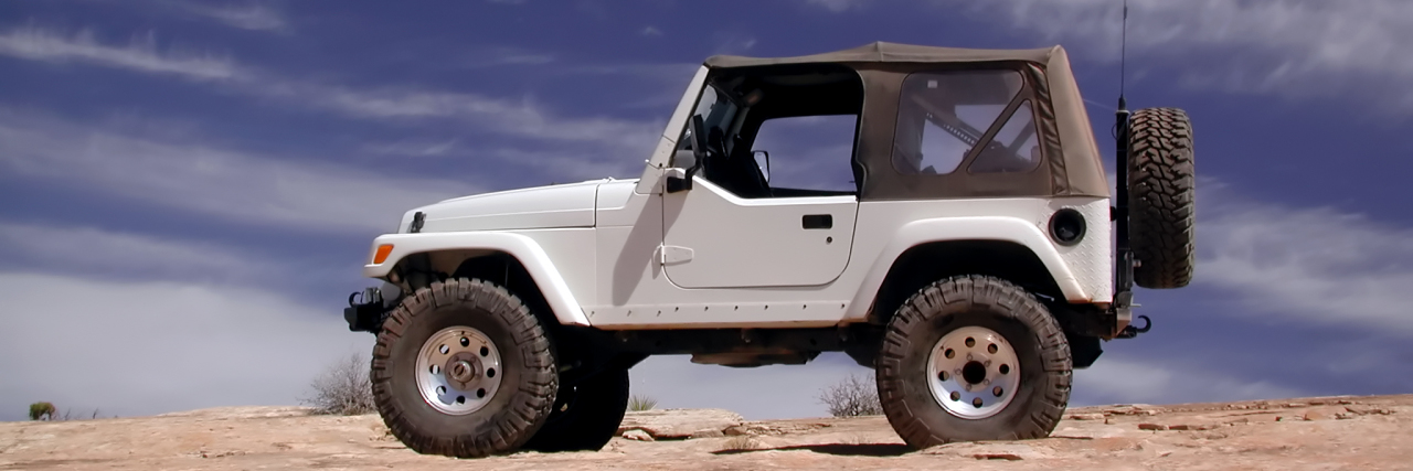 Learning to Truly Listen to My Son on the Autism Spectrum White Jeep on sand