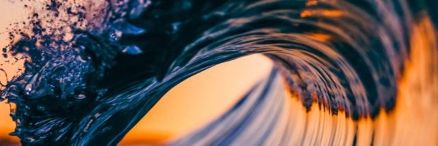 A close up with detail of a wave breaking