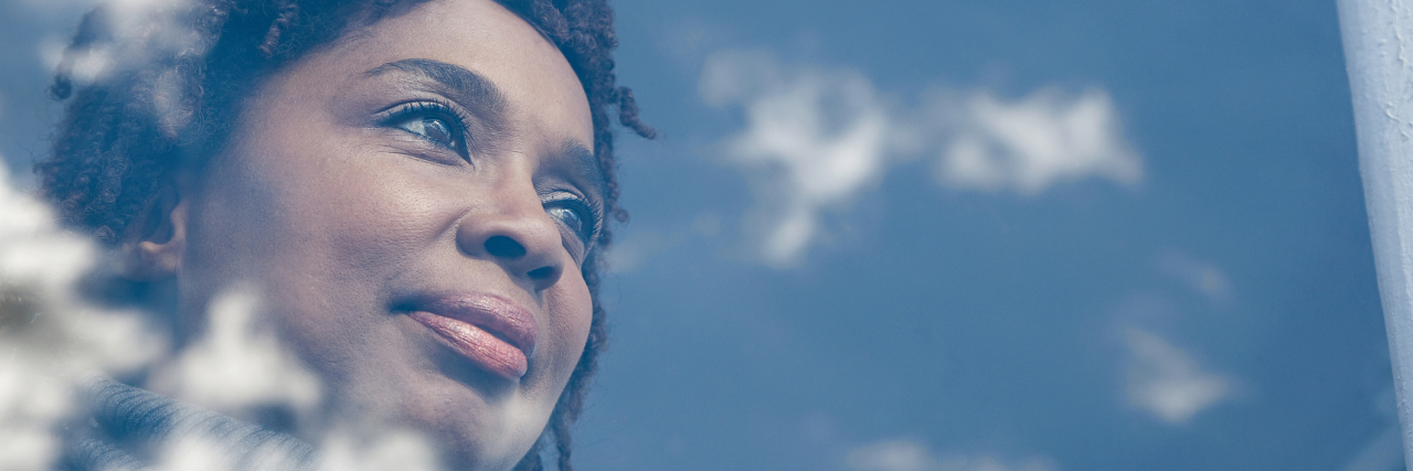 10 Silver Linings to My Stage 4 Cancer Diagnosis woman looking at clouds