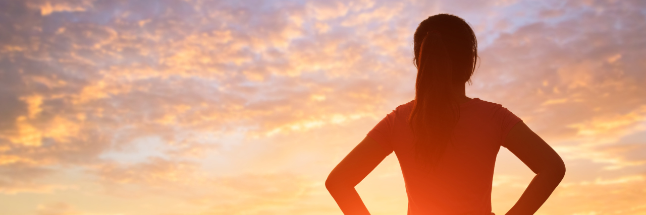 How to Deal With Cerebral Palsy and Mental Health Challenges silhouette of woman with sunlight